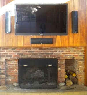   image of large screen tv and fireplace                             
